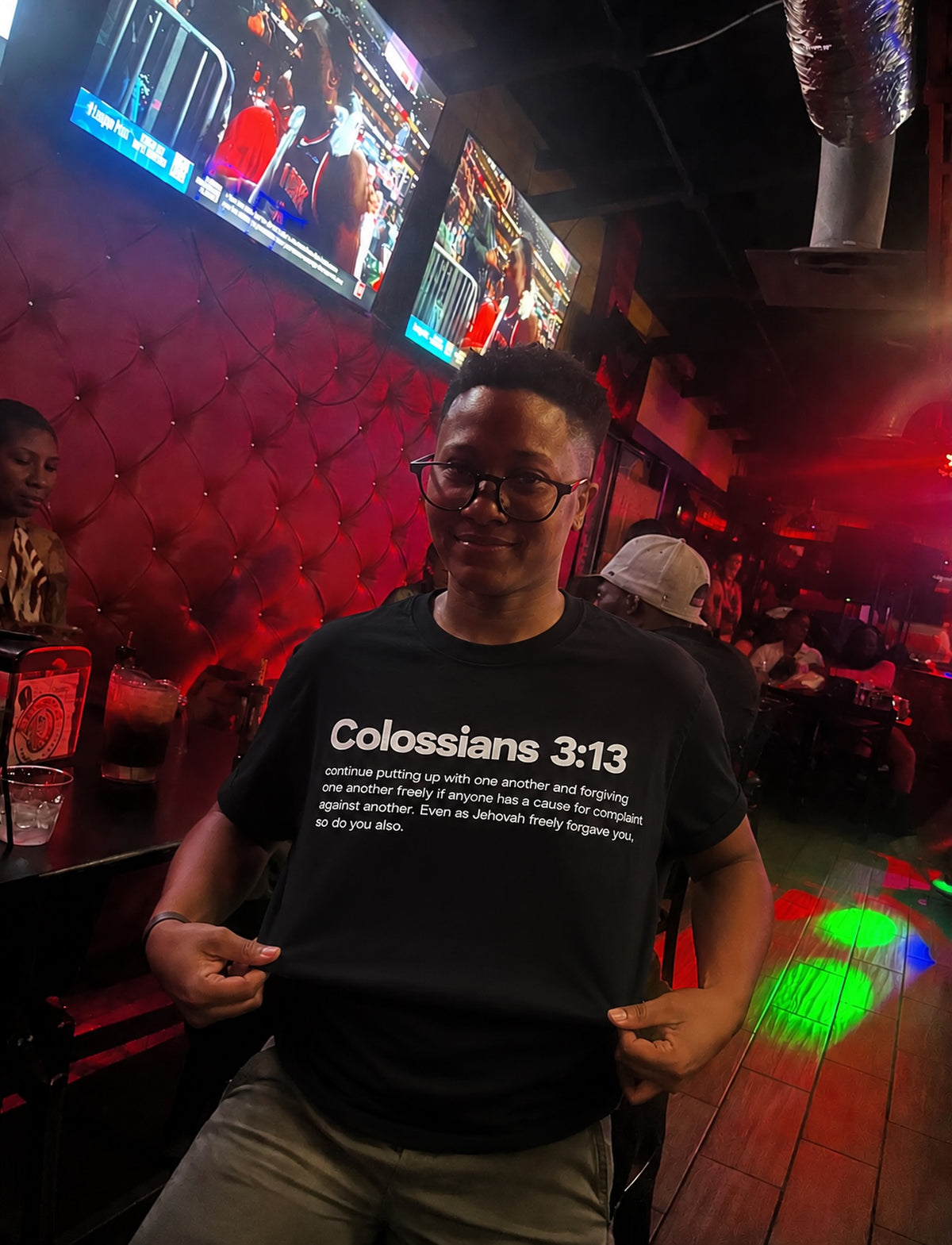 Person wearing the Colossians 3:13 tee