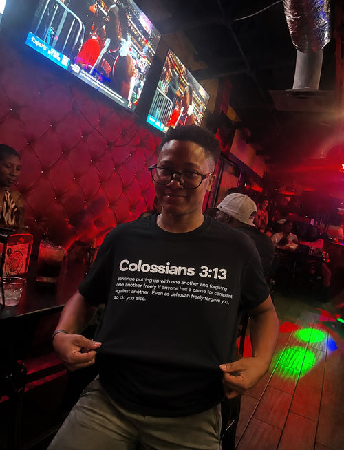 Person wearing the Colossians 3:13 tee