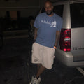 Man wearing the G.H.E.T.T.O. Praying Hands tee